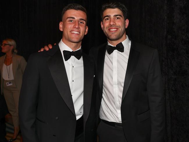 MELBOURNE, AUSTRALIA - September 24, 2023. AFL .   Brownlow medal night at the Crown Casino in Melbourne.  Nick Daicos of the Magpies and Christian Petracca of the Demons  after tonights count   . Photo by Michael Klein.