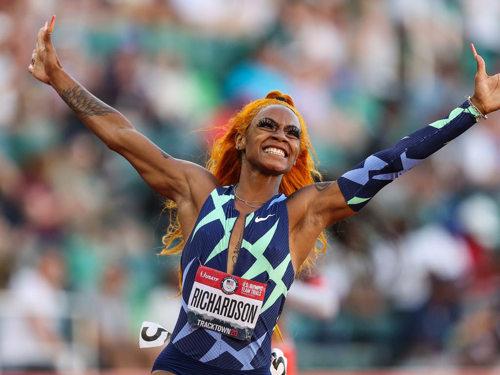 Sha'Carri Richardson celebrates winning the 100m final.