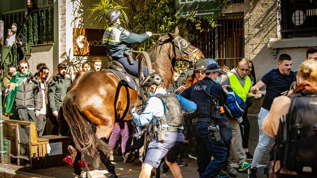 Protesters clash with police in and around Victoria Park in Chippendale, Sydney. Picture: Julian Andrews