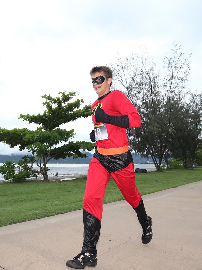 Patrick Markert dressed as a superhero for the Cairns Regional Council's New Year's Eve fun run on the Cairns Esplanade. Picture: Brendan Radke