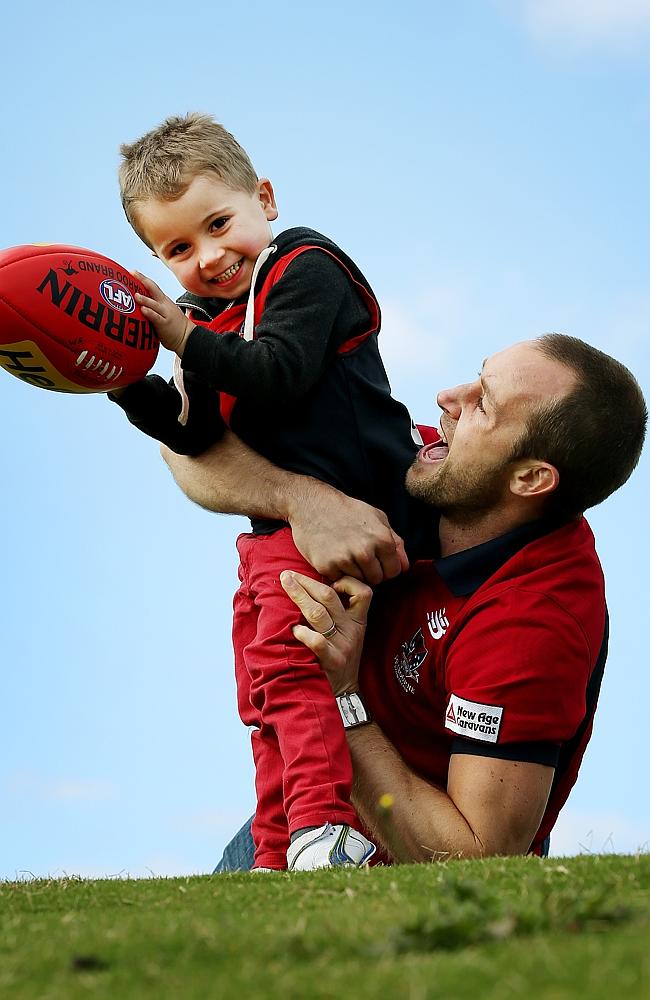 Cross with son Tyler. Picture: Colleen Petch.