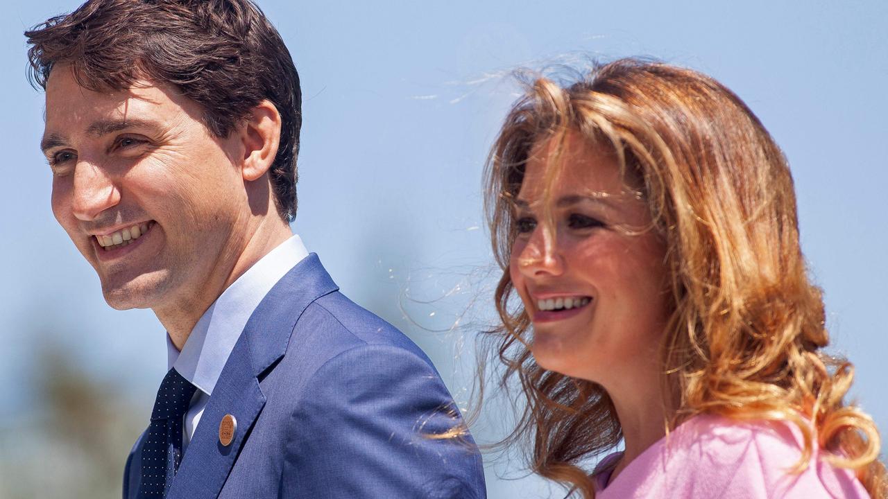 Justin Trudeau and his wife Sophie Gregoire Trudeau arrive for a welcome ceremony for G7 leaders on the first day of the summit in La Malbaie, Quebec, Canada, in 2020. (Photo by GEOFF ROBINS / AFP)