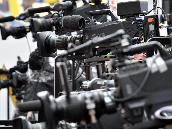 TV cameras are lined up at the red carpet outside the Dolby Theatre as preparations are underway for the 87th annual Academy Awards in Hollywood, California on February 21, 2015. The 87th Oscars take place on February 22 at Hollywood's Dolby Theatre. AFP PHOTO/MLADEN ANTONOV