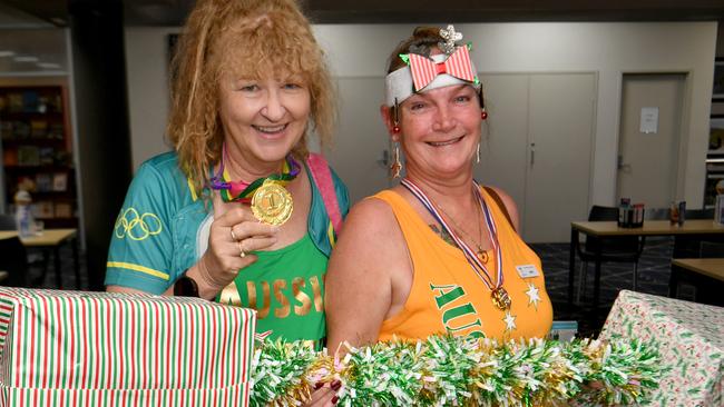 Olympic-themed Legacy Christmas function at the Townsville RSL. Lindy Hensen and Meri Shelley. Picture: Evan Morgan