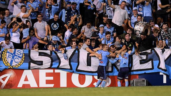 Sydney players and fans celebrate Cam Devlin’s late goal. Picture: AAP.
