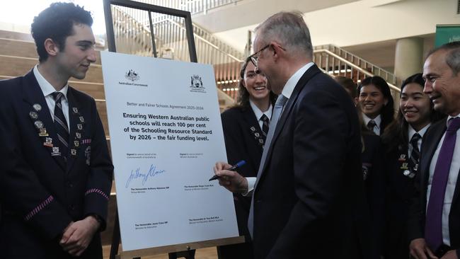 Prime Minister Anthony Albanese and WA Premier Roger Cook (right) signed the school funding deal during a visit to Mount Lawley Senior High School. Picture: NewsWire/Philip Gostelow