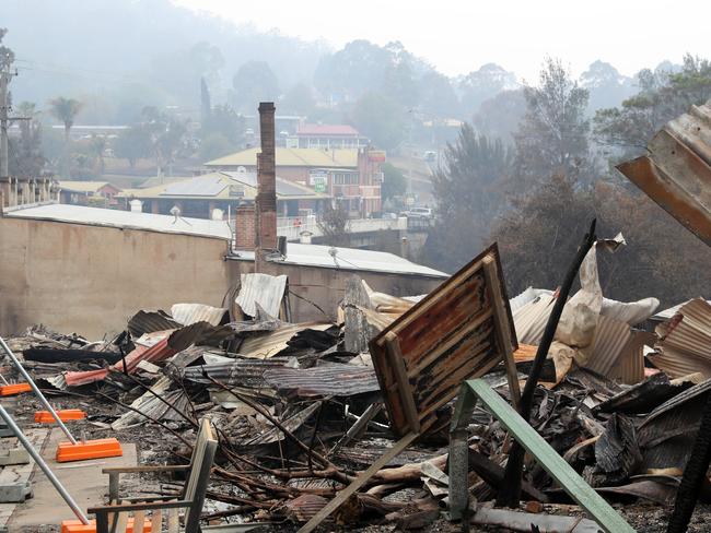 Buildings destroyed by last week's bushfire on the Princes Highway in the main street of Cobargo. The town has lost between 50-60 homes. Picture: Jonathan Ng