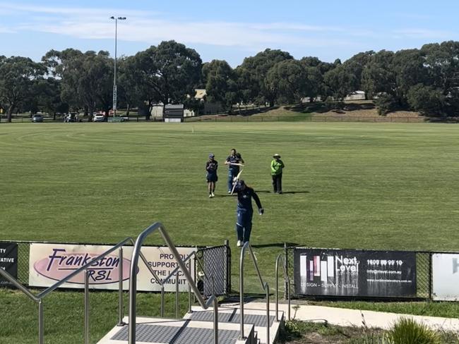 Michael Chaplin raises his bat as he walks off after making 200 not out.