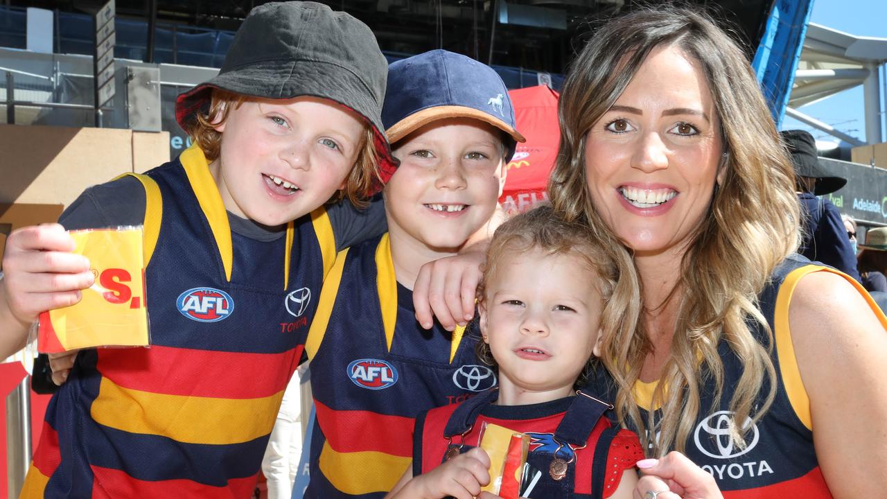 Crows fans enjoy their side’s third flag.