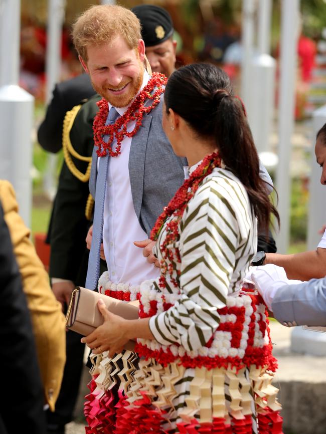 Harry and Meghan attended an exhibition of local handicrafts at the Fa'onelua Convention Centre. Picture: Nathan Edwards