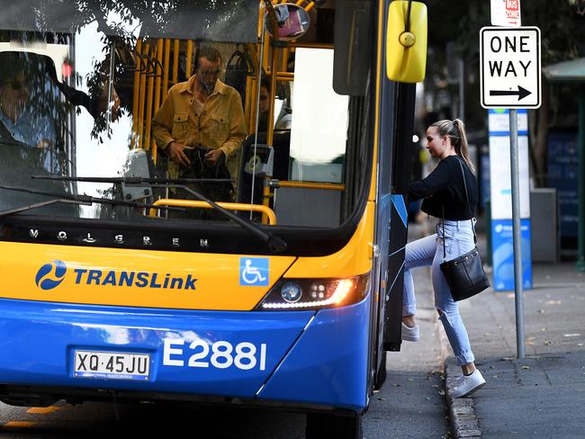 BRISBANE, AUSTRALIA - NCA NewsWire Photos AUGUST, 05, 2020.QUT university students board a bus in Brisbane. Students face losing their concession fares because Translink loophole doesn't grant cheaper fares to external students.Picture: NCA NewsWire/Dan Peled