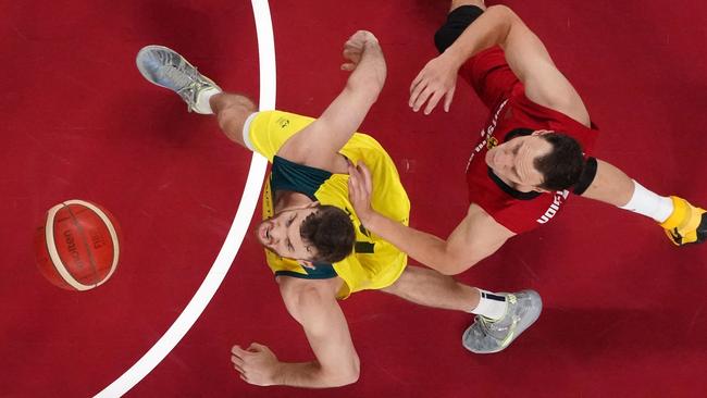 Australia's Nic Kay and Germany's Johannes Voigtmann. Picture: AFP