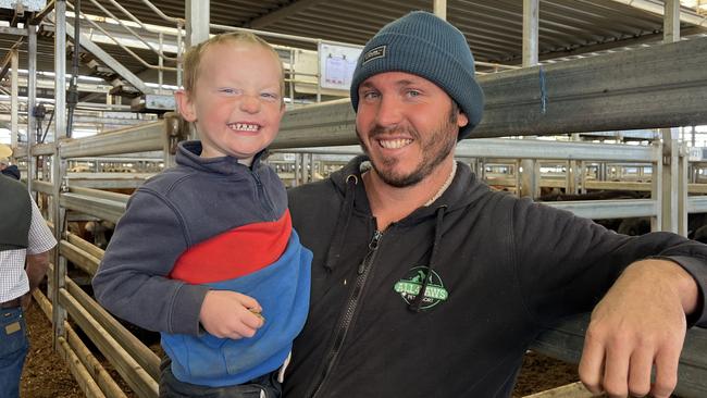 Alex Dekoeyer and his son Louis, 3, from Barnawartha, were looking to buy cattle at the Wodonga store cattle sale but said the prices were higher than he had expected.