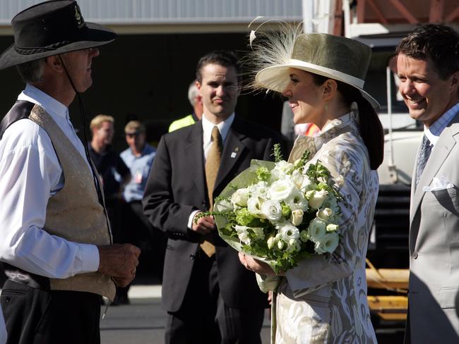 Layton Hodgetts meets Crown Princess Mary and Crown Prince Frederik of Denmark at Hobart Airport in 2005, after the Derwent Valley Concert Band played at the royal wedding in Denmark in 2004. Picture: Chris Kidd