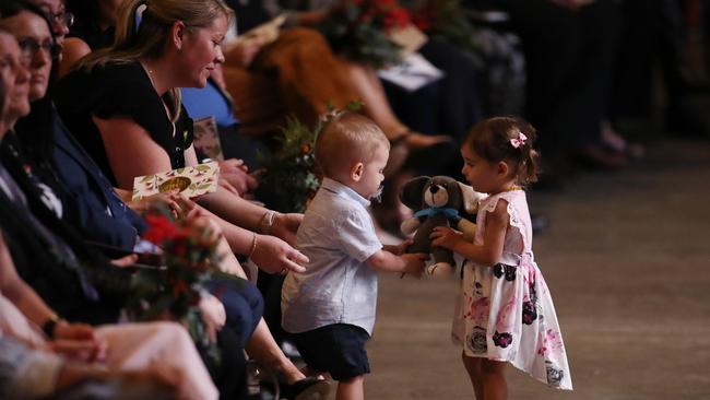 Harvey and Charlotte, children of firefighters Geoffrey Eaton and Andrew O’Dwyer, at the service. Picture: David Swift