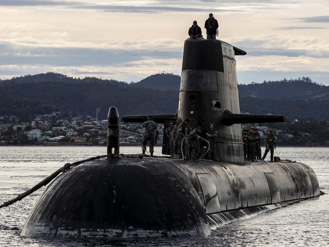 HOBART, AUSTRALIA - APRIL 01: In this handout image provided by the Australian Defence Force, Royal Australian Navy submarine HMAS Sheean arrives for a logistics port visit on April 1, 2021 in Hobart, Australia. Australia, the United States and the United Kingdom have announced a new strategic defence partnership - known as AUKUS - to build a class of nuclear-propelled submarines and work together in the Indo-Pacific region. The new submarines will replace the Royal Australian Navy's existing Collins submarine fleet. (Photo by LSIS Leo Baumgartner/Australian Defence Force via Getty Images)