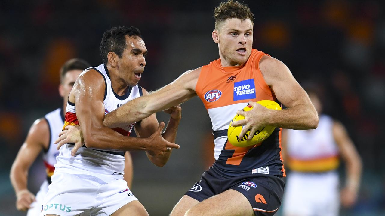 Eddie Betts tries to tackle Heath Shaw.