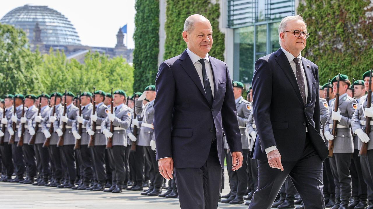 Scholz and Albanese review a guard of honour at the Chancellery in Berlin. Picture: Getty Images