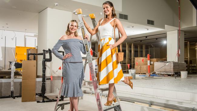 Models in the construction site of the doomed Debenhams store in Collins Street in 2017. Picture: Eugene Hyland