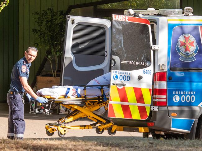 A suspected drug overdose at Richmonds Safe Injecting Room. A person has been brought out with staff assisting breathing. Saff attempt to block photos.  Police arrest and search suspected drug dealers and user around Victoria and Elizabeth street Richmond.  Picture: Jason Edwards