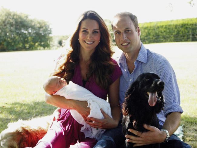 Princess Catherine, Prince William and a baby Prince George with Lupo, the couple's cocker spaniel, in 2013. Lupo died in 2020. Picture: Getty Images