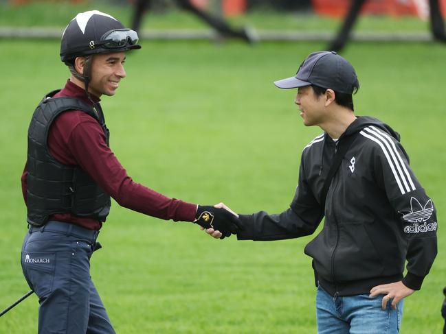 The Daily Telegraph 30.10.2024 Jockey Joao Moreira greets Corazon Beat trainer Shizuya Kato, pictured. Canterbury trackwork with the four internationals here for the Golden Eagle - Ascoli Piceno, Corazon Beat, Lake Forest and Lazzat. Picture: Rohan Kelly.