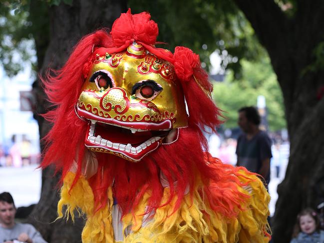 a performance by Chinese lions on Parliament House Lawns. Picture: SAM ROSEWARNE