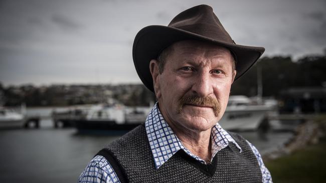 Break O' Day Mayor and owner of the newsagency in St Helens, Mick Tucker. Picture: LUKE BOWDEN