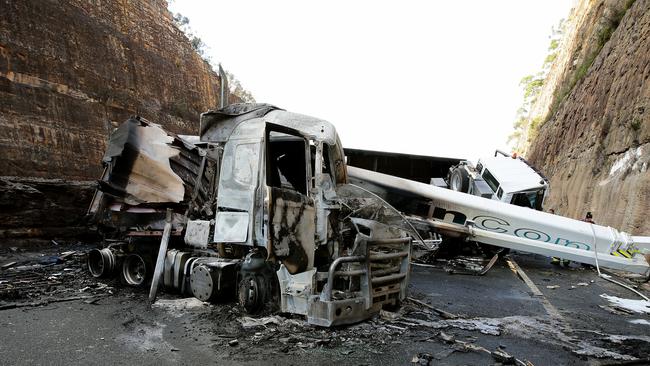 Trucks that crashed and caught fire, blocking the Northbound lane on the M1 motorway just south of the Hawkesbury River bridge near Brooklyn. Picture: Troy Snook