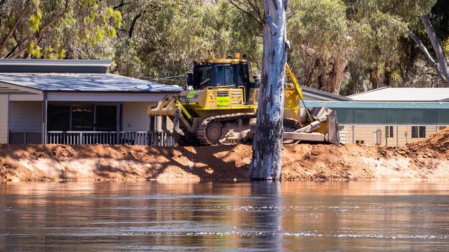 Works on a levy at Riverbend caravan park in Renmark. Picture: Tom Huntley