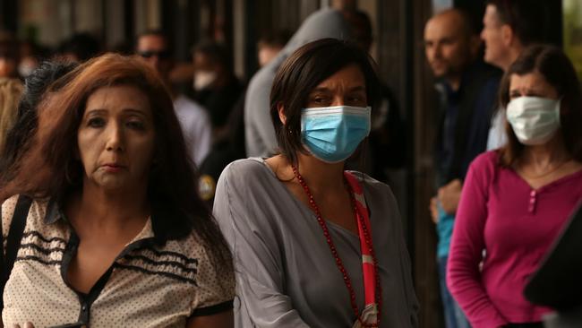 People queue outside the Centrelink office in Marrickville today. Picture: AAP