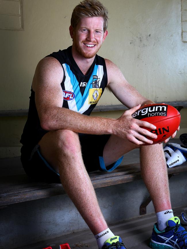 Matthew Lobbe in his playing days for Port Adelaide. He has detailed his family’s mental illness history to help reduce stigma. Photo: Sarah Reed