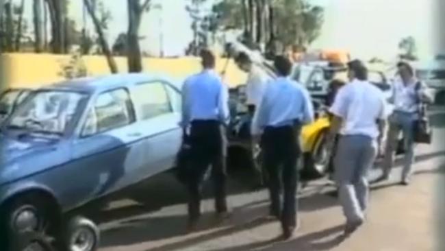 Police take away the Holden Gemini used in the murder of Janine Balding. Picture Crime Investigation Australia