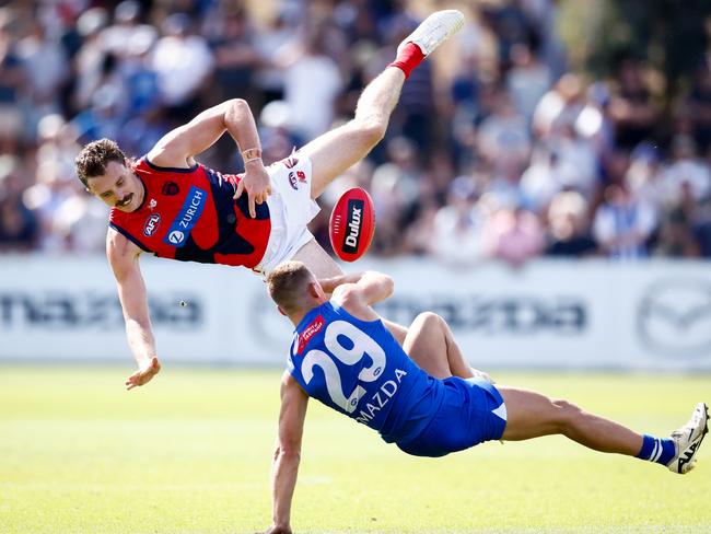 And both hit the deck. Picture: Dylan Burns/AFL Photos