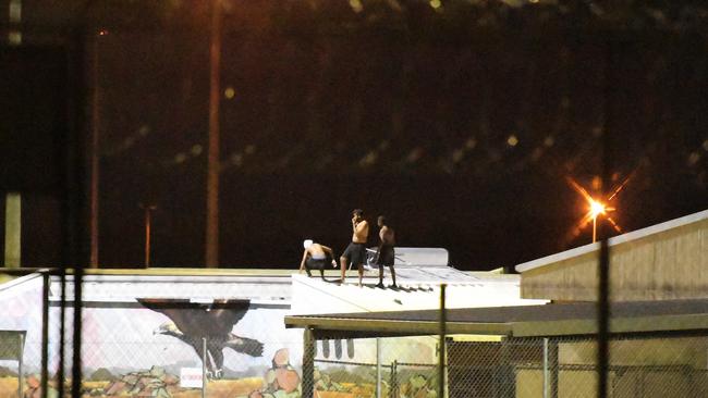 Detainees are seen on the roof at Don Dale Youth Detention Centre in Berrimah on Friday, April 19, 2019. PICTURE: KERI MEGELUS