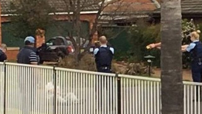 Police surround suspect with tasers drawn. Picture: Supplied