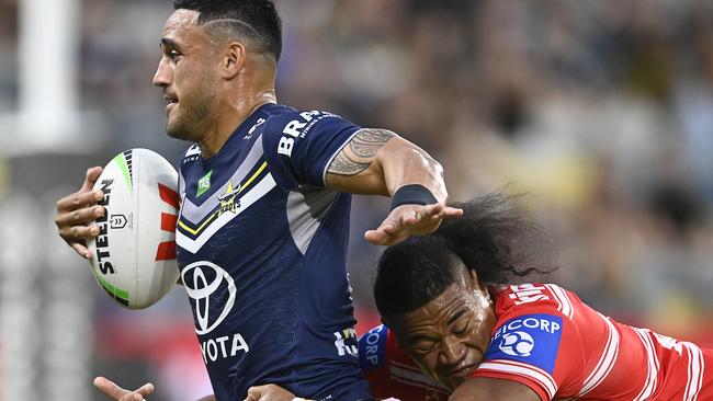 Valentine Holmes of the Cowboys is tackled by Mosese Suli of the Dragons during the round 11 NRL match between North Queensland Cowboys and St George Illawarra Dragons at Queensland Country Bank Stadium on May 13, 2023 in Townsville, Australia. Picture: Ian Hitchcock/Getty Images