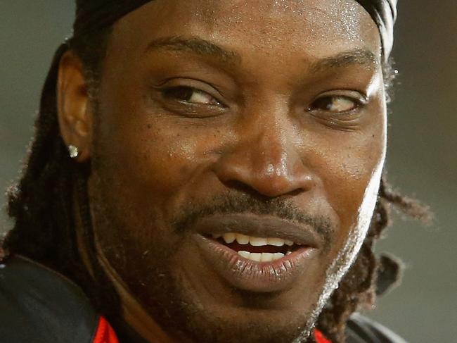 HOBART, AUSTRALIA - JANUARY 04: Chris Gayle of the Melbourne Renegades gives a TV interview to Mel Mclaughlin during the Big Bash League match between the Hobart Hurricanes and the Melbourne Renegades at Blundstone Arena on January 4, 2016 in Hobart, Australia. (Photo by Darrian Traynor/Getty Images)