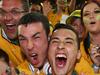 SYDNEY, AUSTRALIA - JANUARY 31: Jason Davidson of Australia celebrates with fans after Australia defeated Korea Republic during the 2015 Asian Cup final match between Korea Republic and the Australian Socceroos at ANZ Stadium on January 31, 2015 in Sydney, Australia. (Photo by Robert Cianflone/Getty Images) *** BESTPIX ***