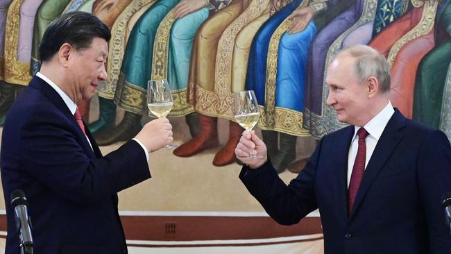 Russian President Vladimir Putin and China's President Xi Jinping are close. (Photo by Pavel Byrkin / SPUTNIK / AFP)