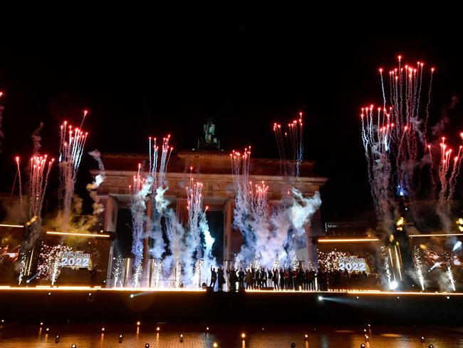 Fireworks explode at Brandenburg Gate in Berlin to celebrate the New Year on January 1, 2022. Picture: AFP