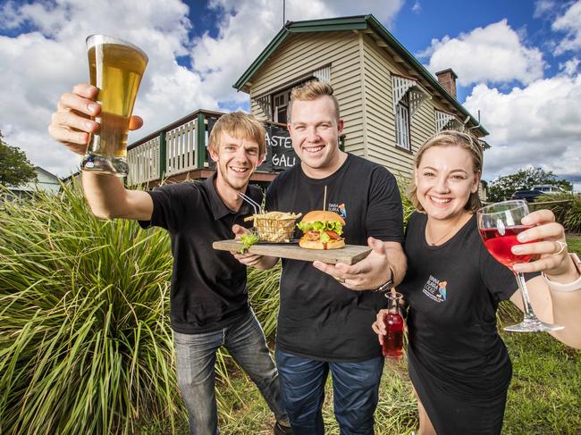 HOLD FOR SATURDAY ** Fire tourism - Binna Burra. Staff from Binna Burra Lodge, who are now operating out of a country hall while they wait for the all-clear to return to the famous property.Binna Burra kitchen staff Scott Parker, Leighton Pitcher and Tilsa Pitcher at Headmasters Cafe in Beechmont. Picture: NIGEL HALLETT