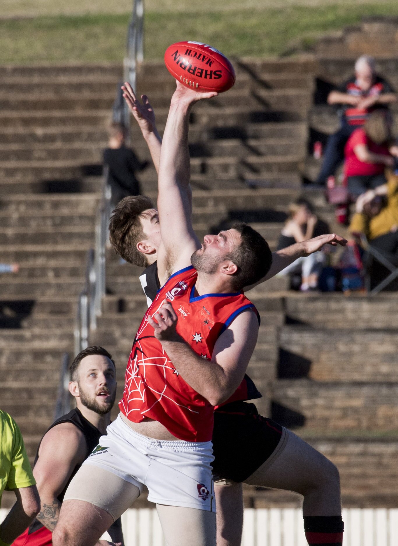 Tyler Gilmore, Bombers and Carmelo Citrigno, Warwick. Picture: Nev Madsen