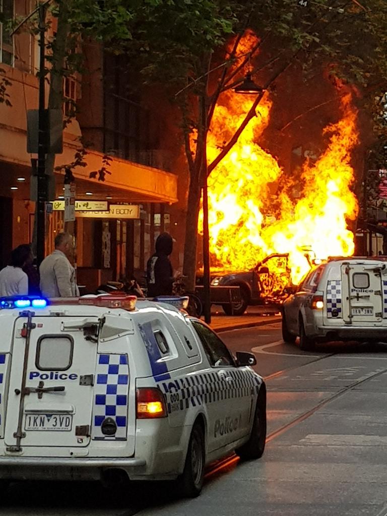 A ute went up in flames on Bourke St on Friday. Picture: Nick Weeks.