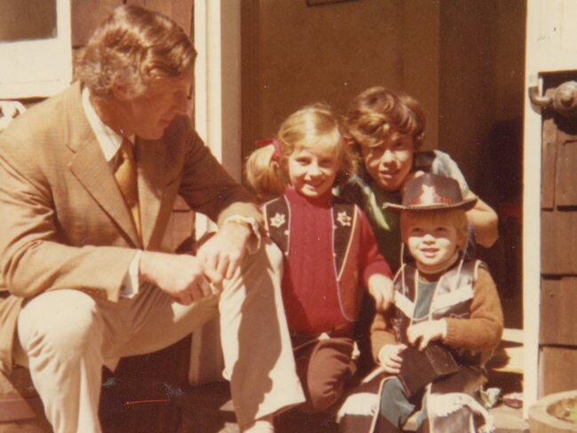 Max Elliot pictured with three of his four children. Tim is the youngest in the cowboy hat.