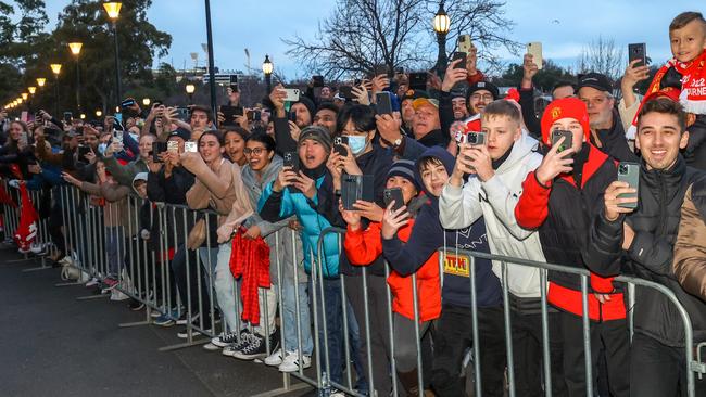 Manchester United fans gather in Federation Square to greet the players. Picture: Ian Currie