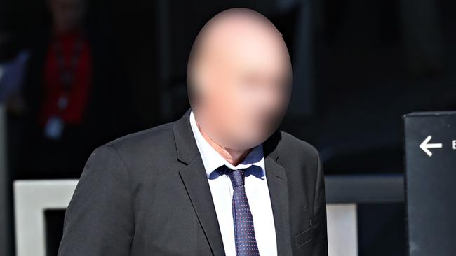 A policeman is standing trail for the alleged sexual assault of a female colleague at a Brisbane police station.