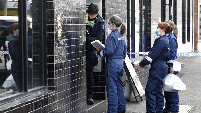 Police at the former Royal Hotel in Footscray where a woman was allegedly murdered. Picture: Andrew Henshaw