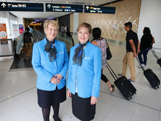 Sydney airport's volunteer ambassadors ( L to r ) Yvonne Merchant and Adele McWhinney pictured at Sydney international terminal, wearing their new uniforms.