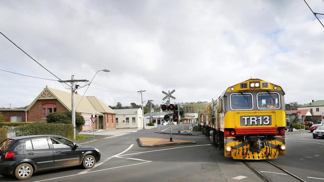 TasRail train passes through a rail crossing at Penguin. Picture: Chris Kidd